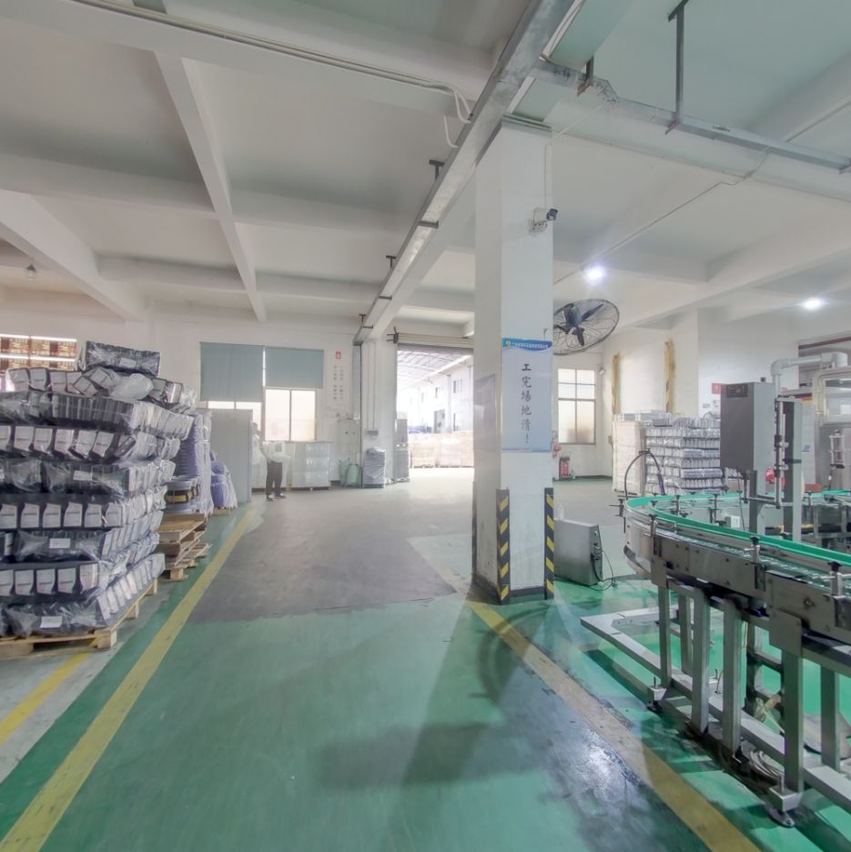Conveyor equipment and stacked packaging inside a lubricant production workshop